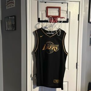 Wore once. XXL Black and Gold Kobe Bryant Jersey.